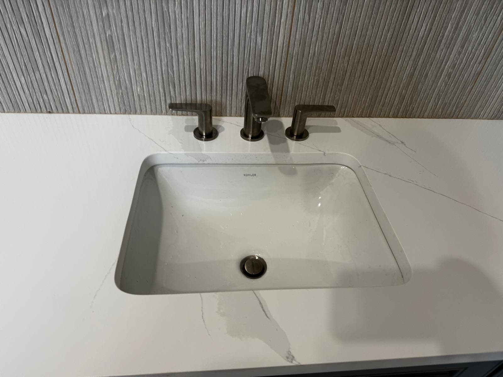 Kohler undermount sink set in quartz bathroom vanity countertop, Atlanta, GA