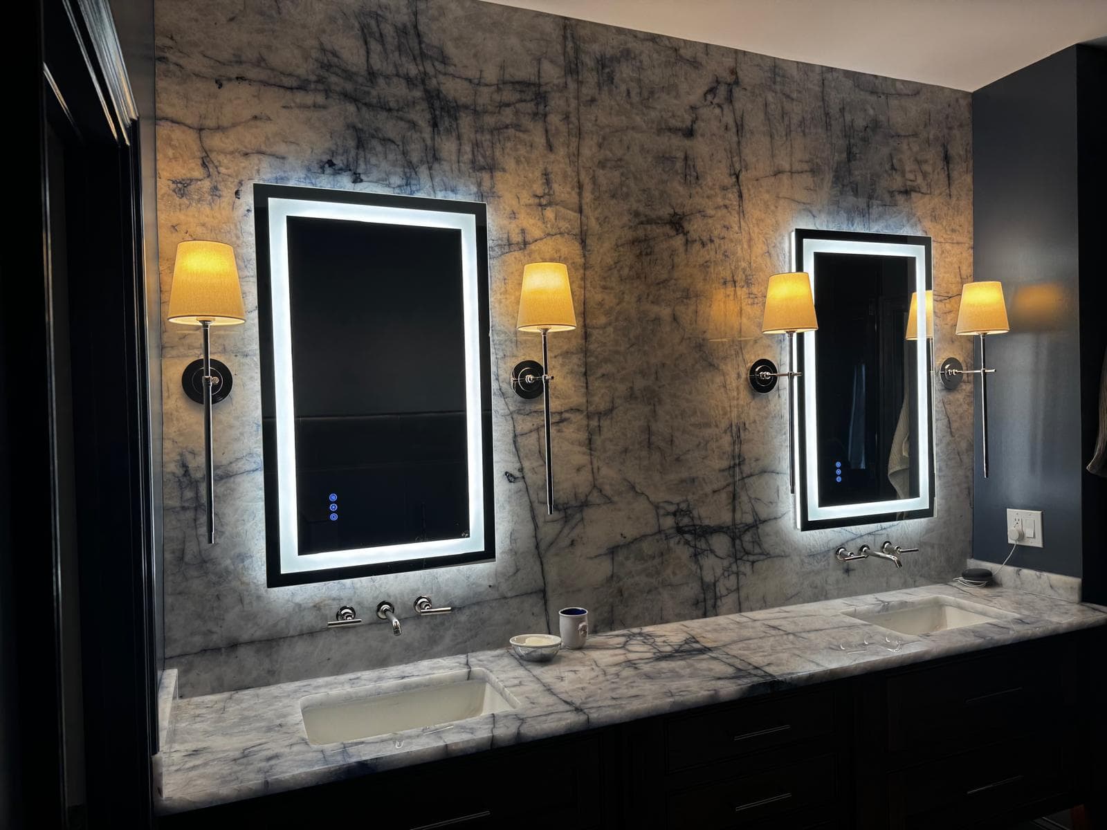 Walnut double vanity with blue quartzite backsplash and backlit mirrors, Atlanta, GA