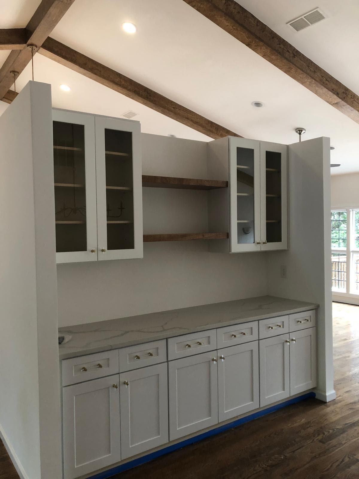 Custom glass-front hutch cabinetry with quartz countertop, Atlanta, GA