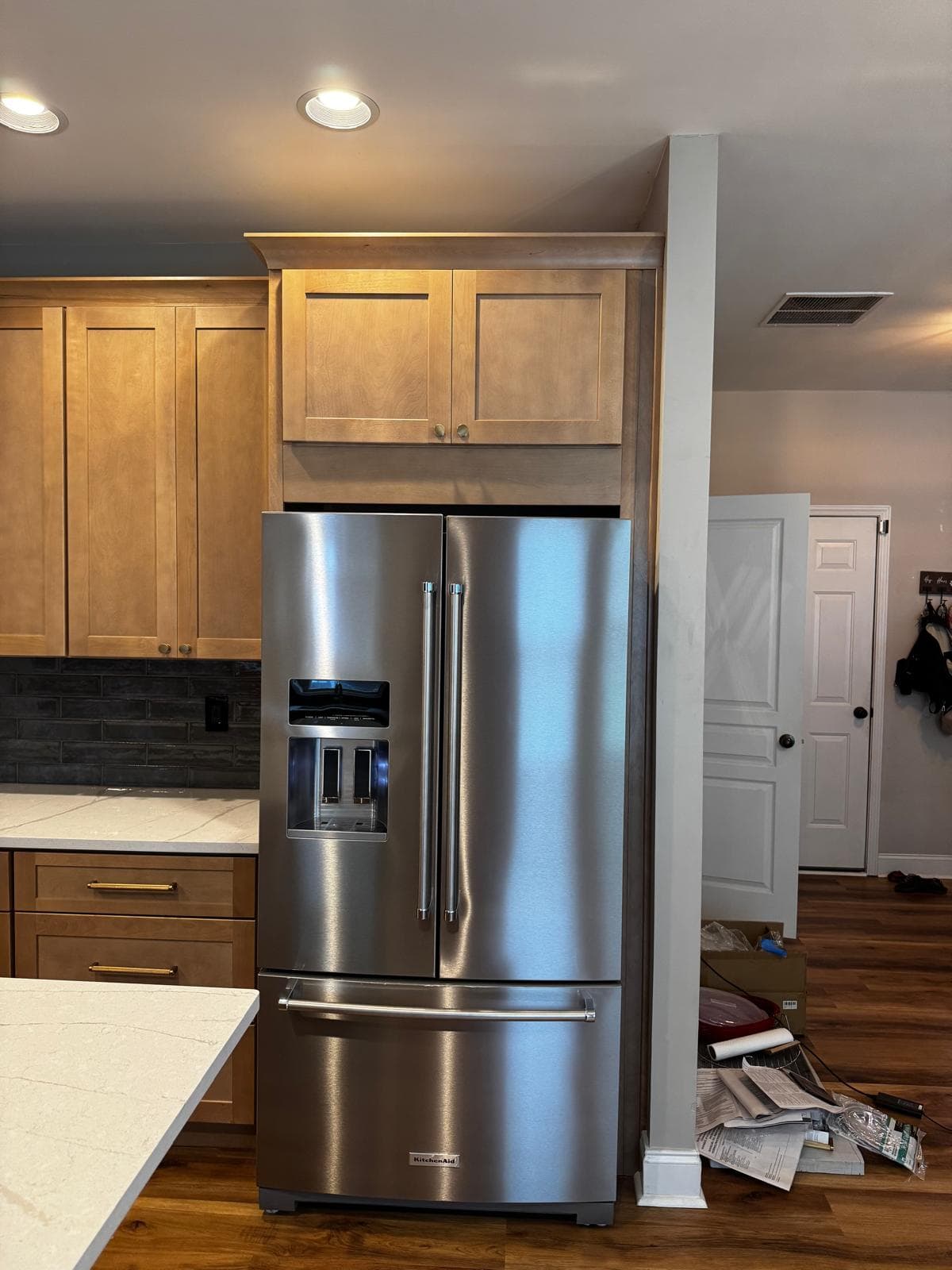 Quartz countertop detail on honey oak kitchen island, Atlanta, GA